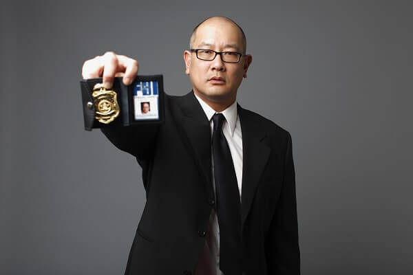 FBI agent showing badge