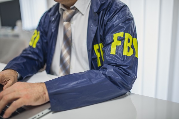 FBI Agent on Computer