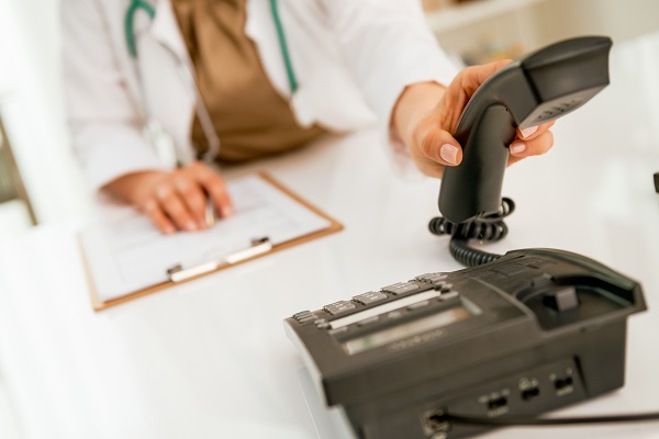 Doctor talking on phone