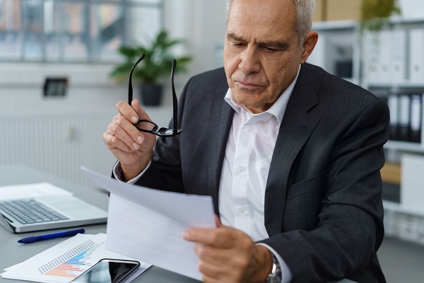 Man reading letter